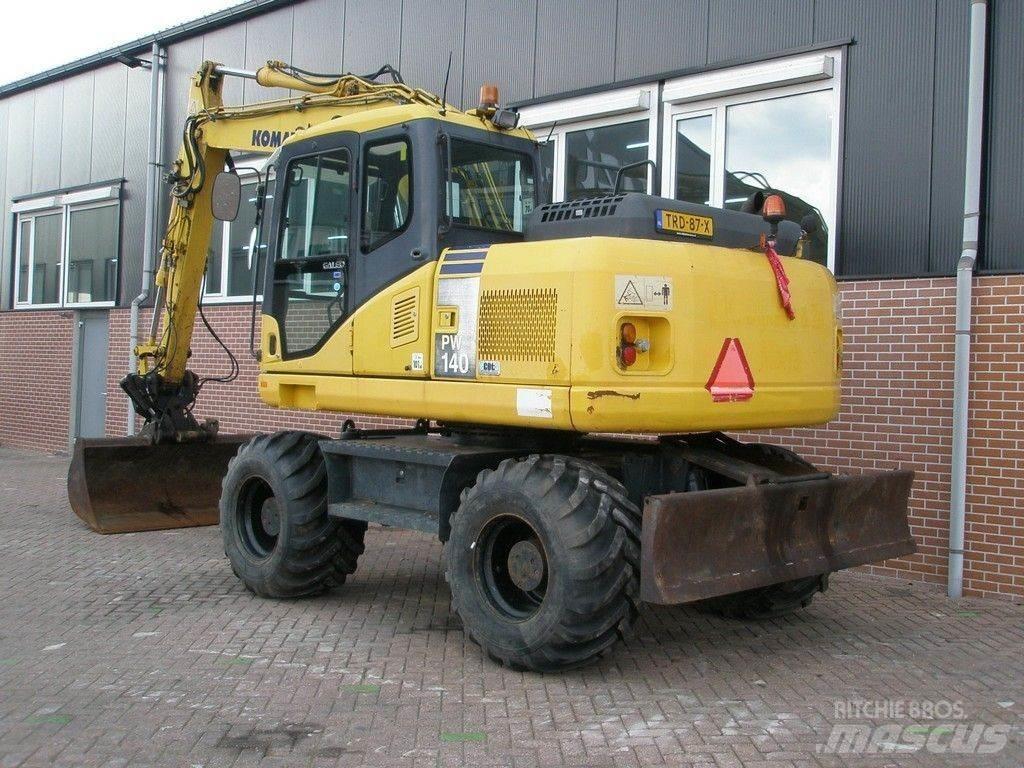 Komatsu PW140-7 Excavatoare cu roti