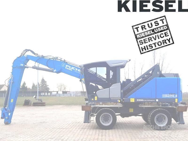 Fuchs MHL 320 F Paleta de manipulare
