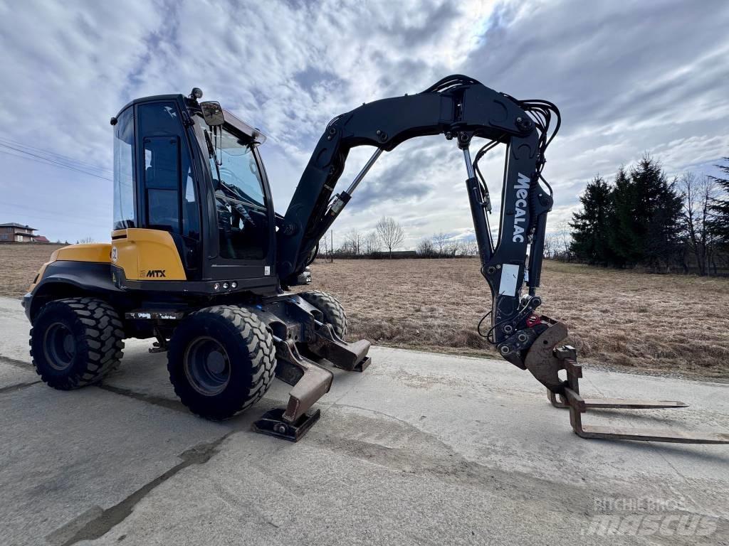 Mecalac 12 MTX Buldoexcavatoare