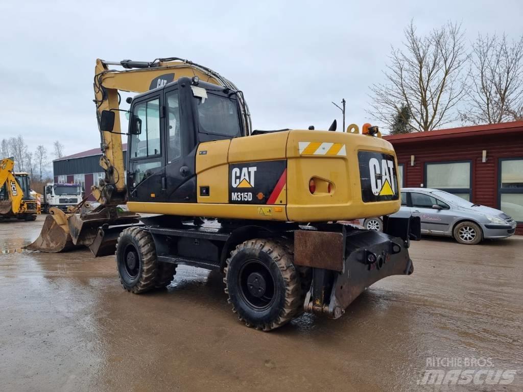 CAT M 315 D II Excavatoare cu roti