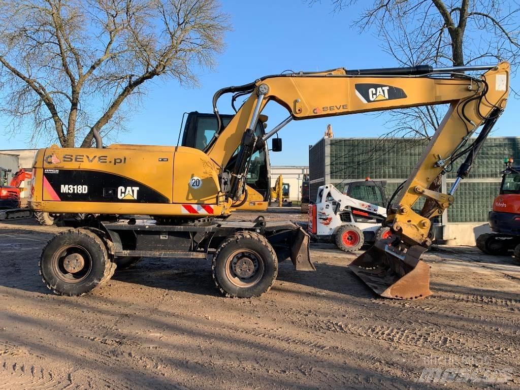 CAT M 318 D Excavatoare cu roti