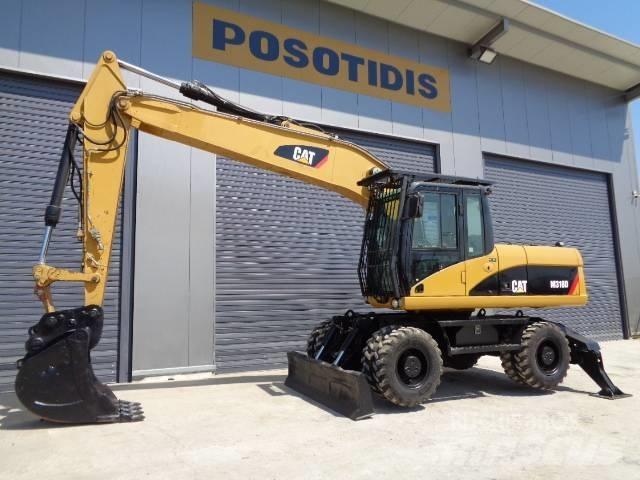 CAT M 318 D Excavatoare cu roti