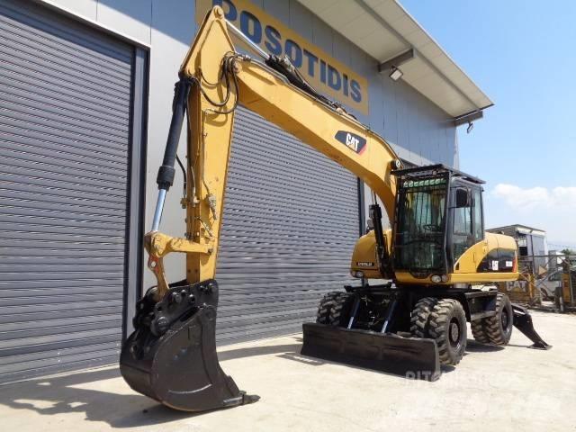 CAT M 318 D Excavatoare cu roti