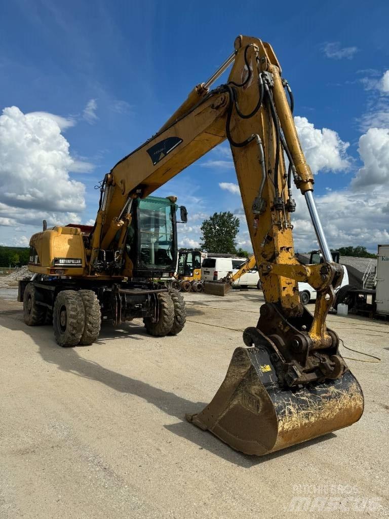 CAT 315 C Excavatoare cu roti