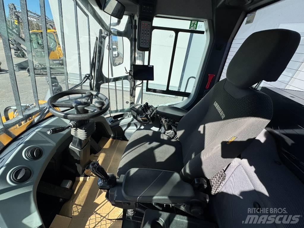 Liebherr L 556 Incarcator pe pneuri