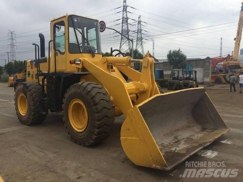 Komatsu WA 320 Buldoexcavatoare