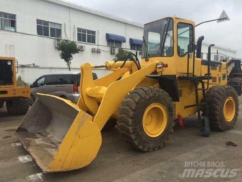 Komatsu WA 320 Buldoexcavatoare