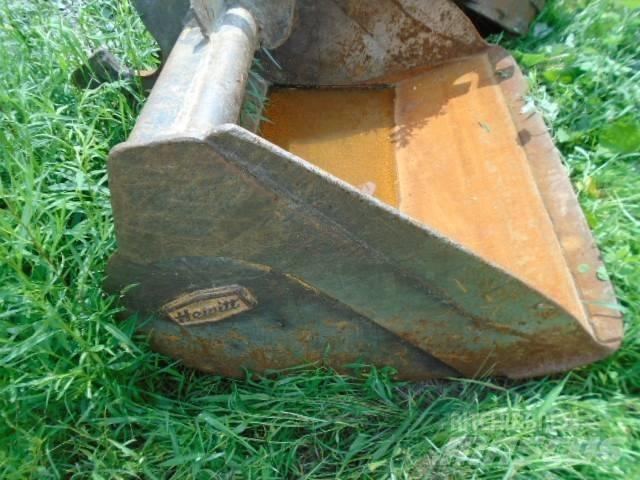 CAT 215 Excavatoare pe șenile
