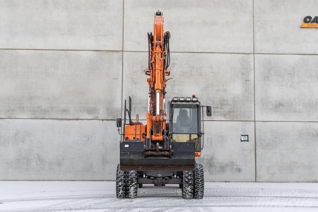 Doosan DX 140 W-3 Excavatoare cu roti