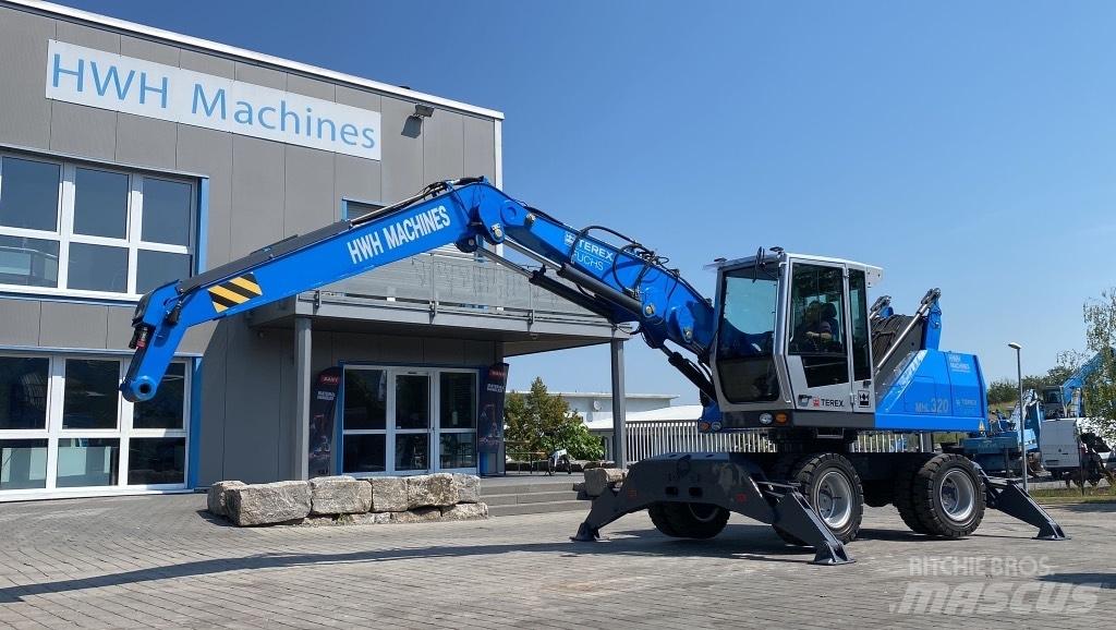 Fuchs MHL 320 D Paleta de manipulare