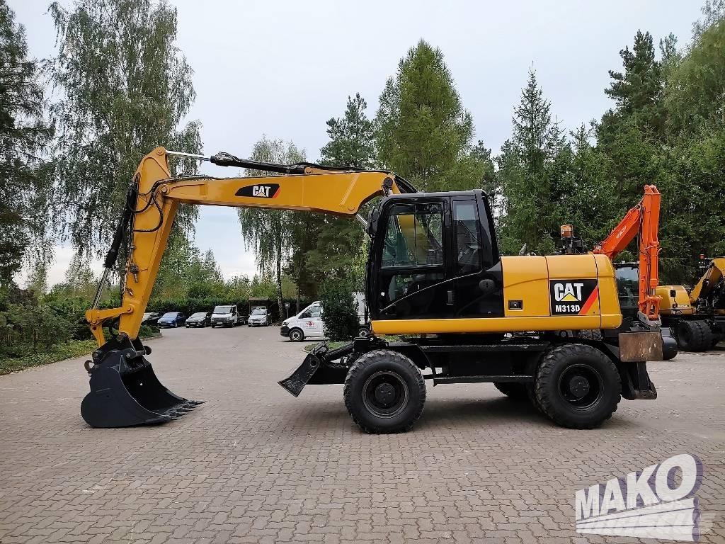 CAT M 313 D Excavatoare cu roti