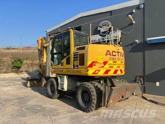 Komatsu PW 148 Excavatoare cu roti