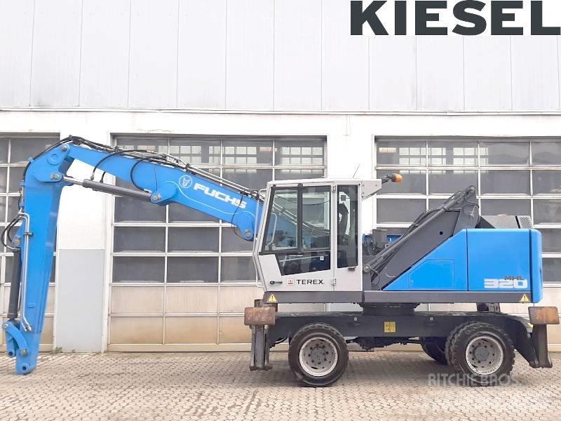 Fuchs MHL 320 F Paleta de manipulare