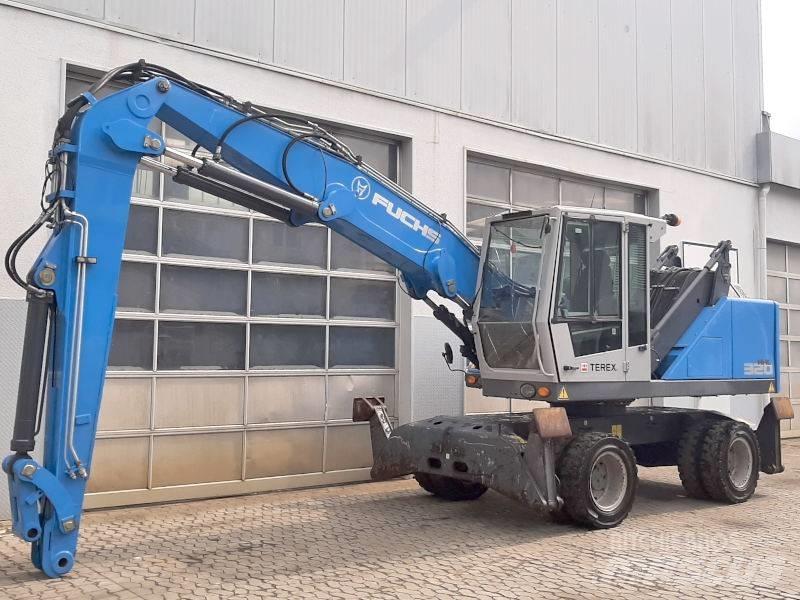 Fuchs MHL 320 F Paleta de manipulare