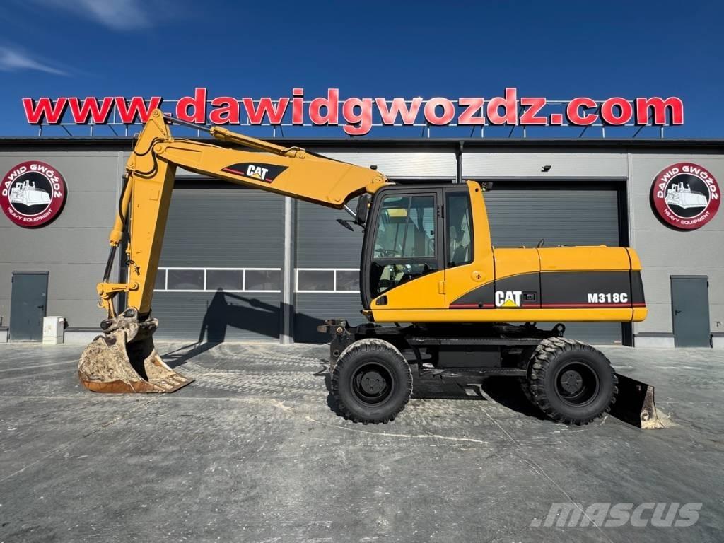 CAT M 318 C Excavatoare cu roti