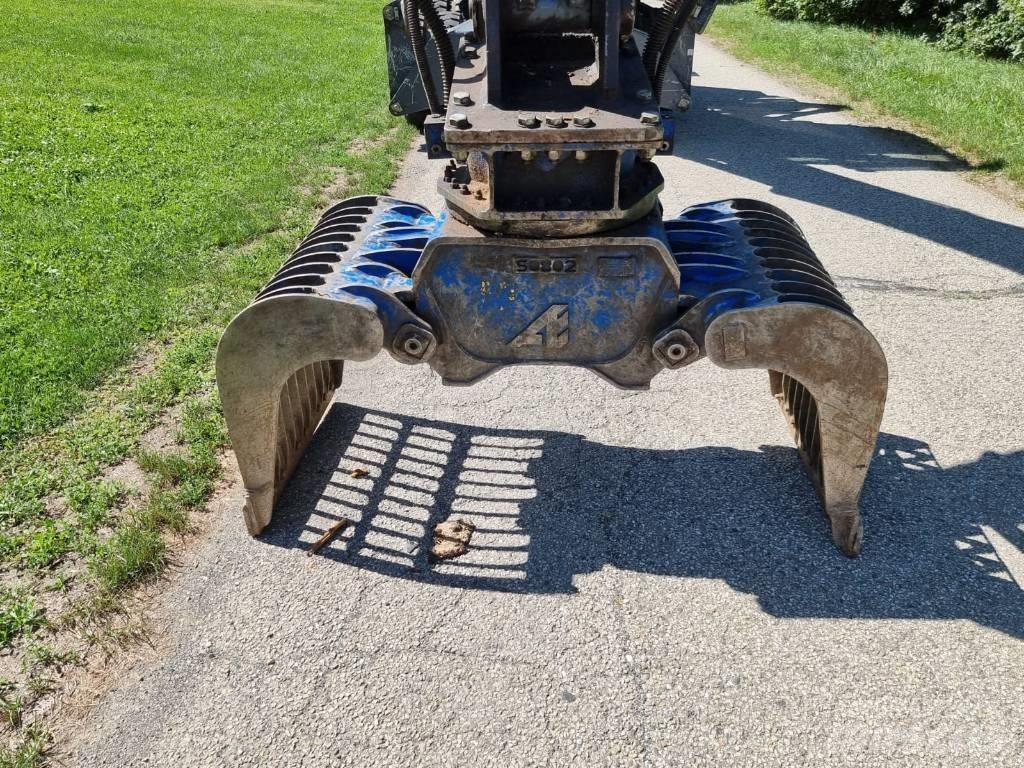 Fuchs MHL 250 Paleta de manipulare