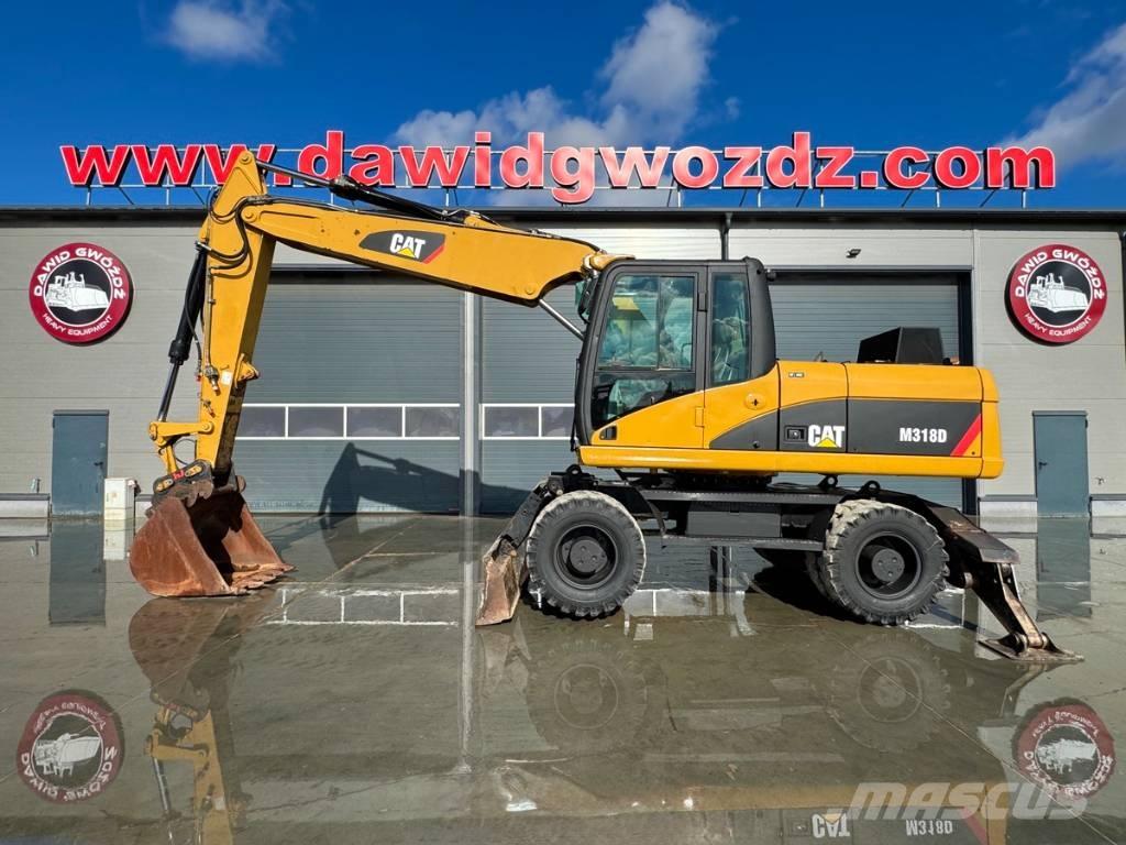 CAT M 318 D Excavatoare cu roti