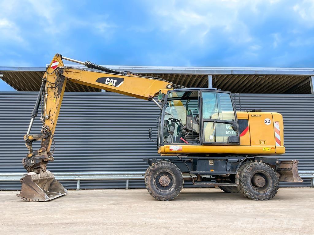 CAT M318F Excavatoare cu roti