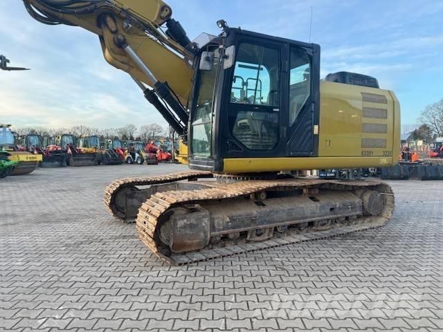 CAT 323 EL Excavatoare pe șenile
