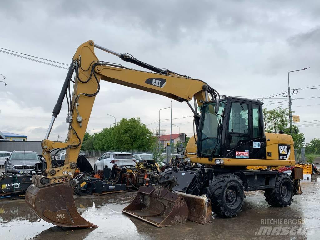 CAT M 313 D Excavatoare cu roti