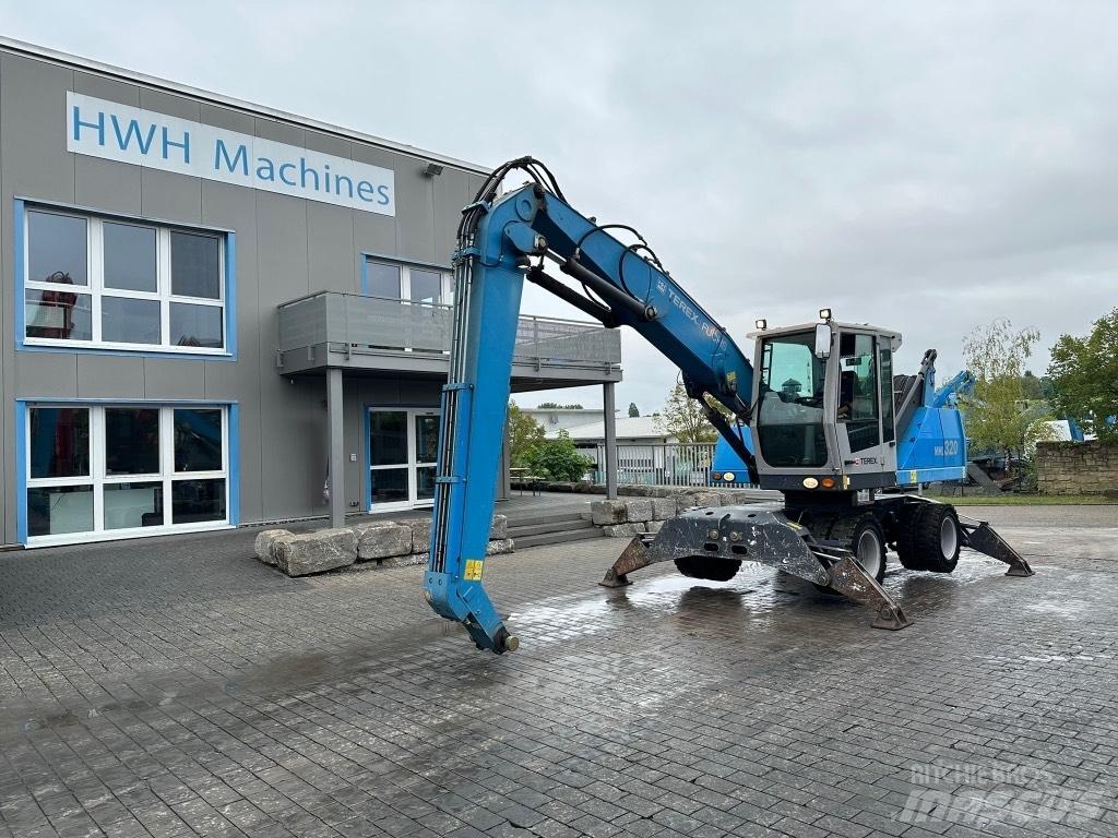 Fuchs MHL 320 D Paleta de manipulare
