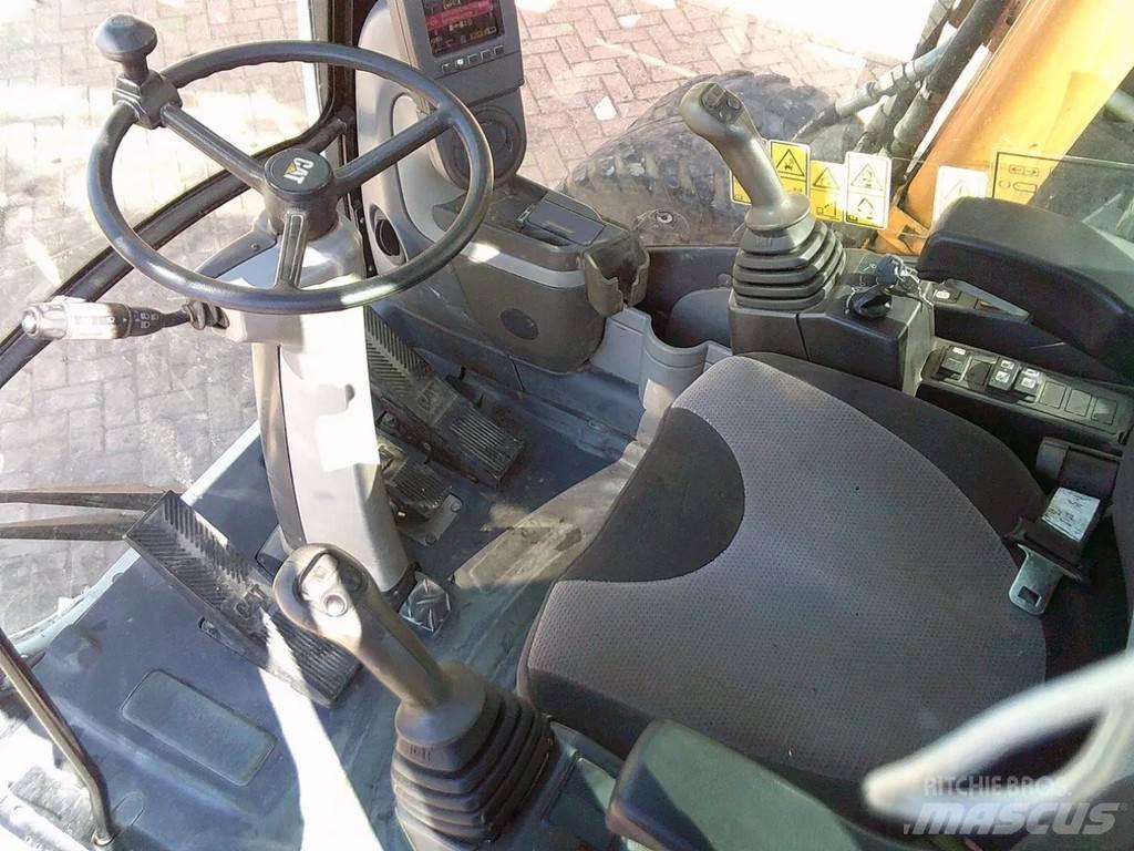CAT M313D Excavatoare cu roti