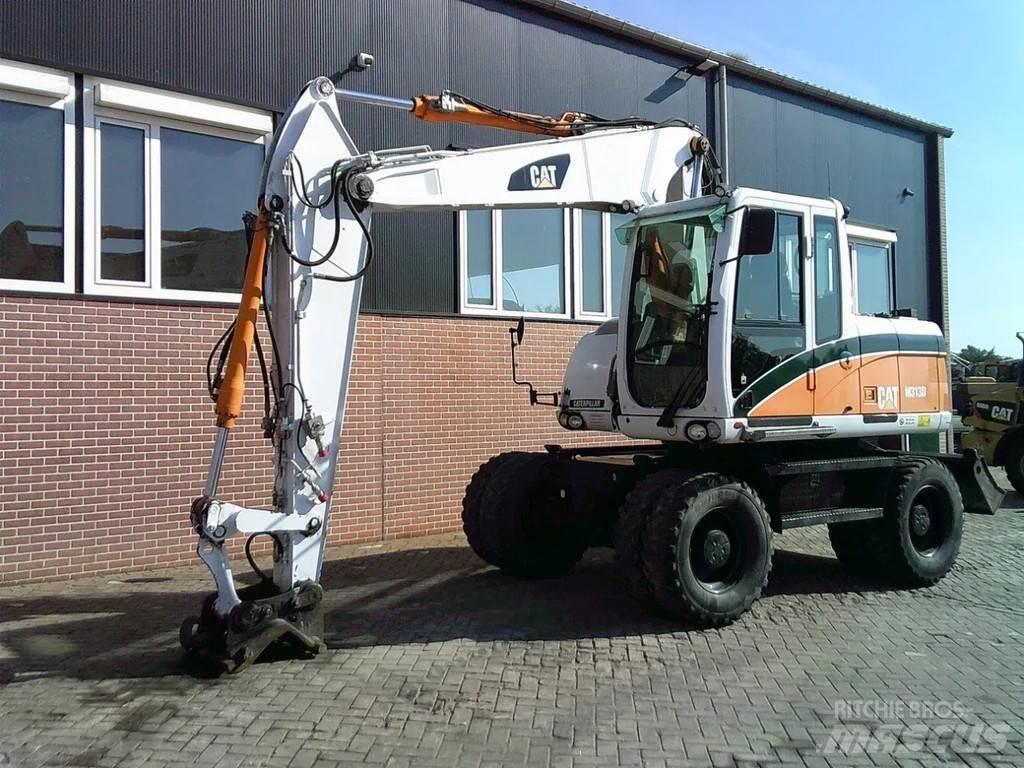 CAT M313D Excavatoare cu roti