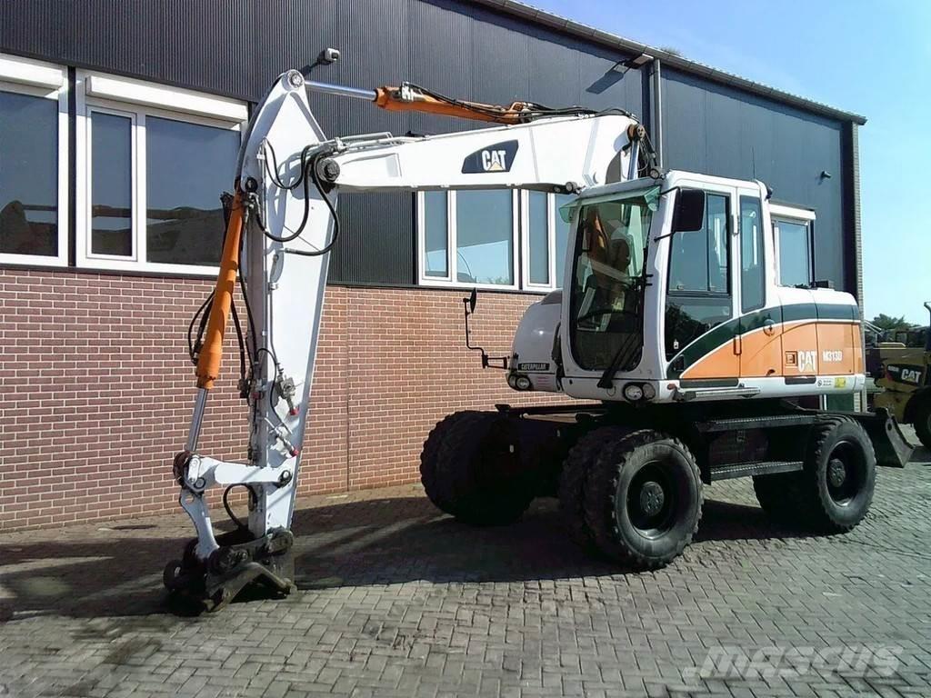 CAT M313D Excavatoare cu roti