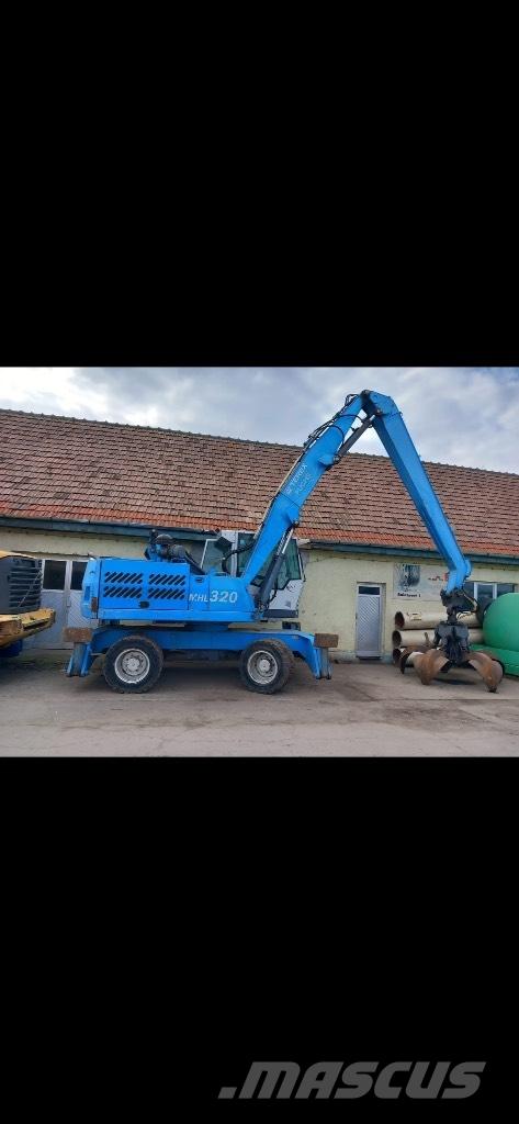 Fuchs MHL 320 Excavatoare cu roti