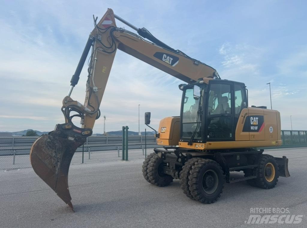 CAT M 318 F Excavatoare cu roti
