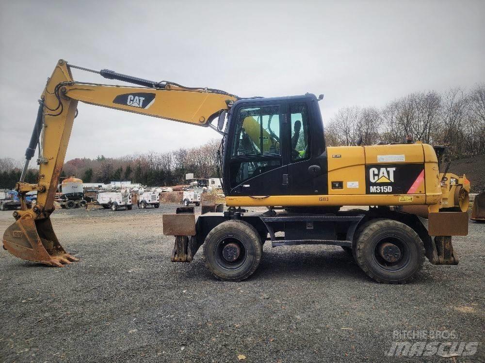 CAT M 315 D Excavatoare cu roti