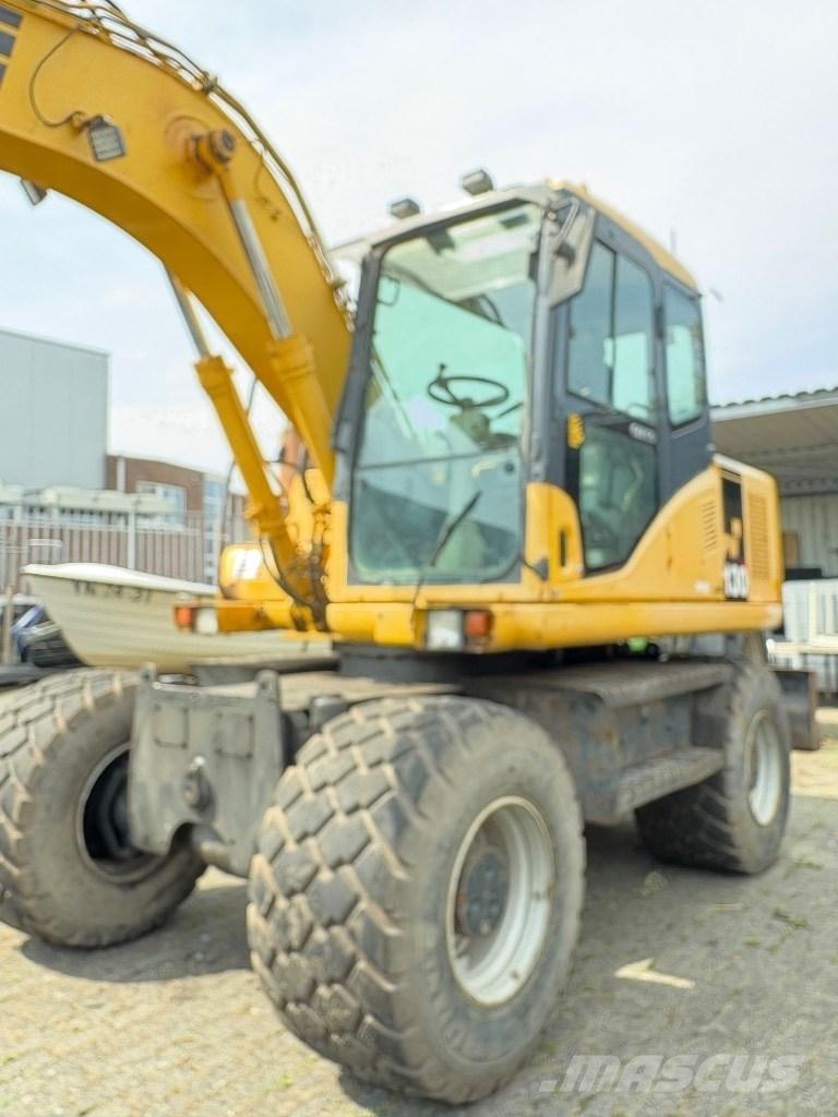 Komatsu PW 130-7K Excavatoare cu roti