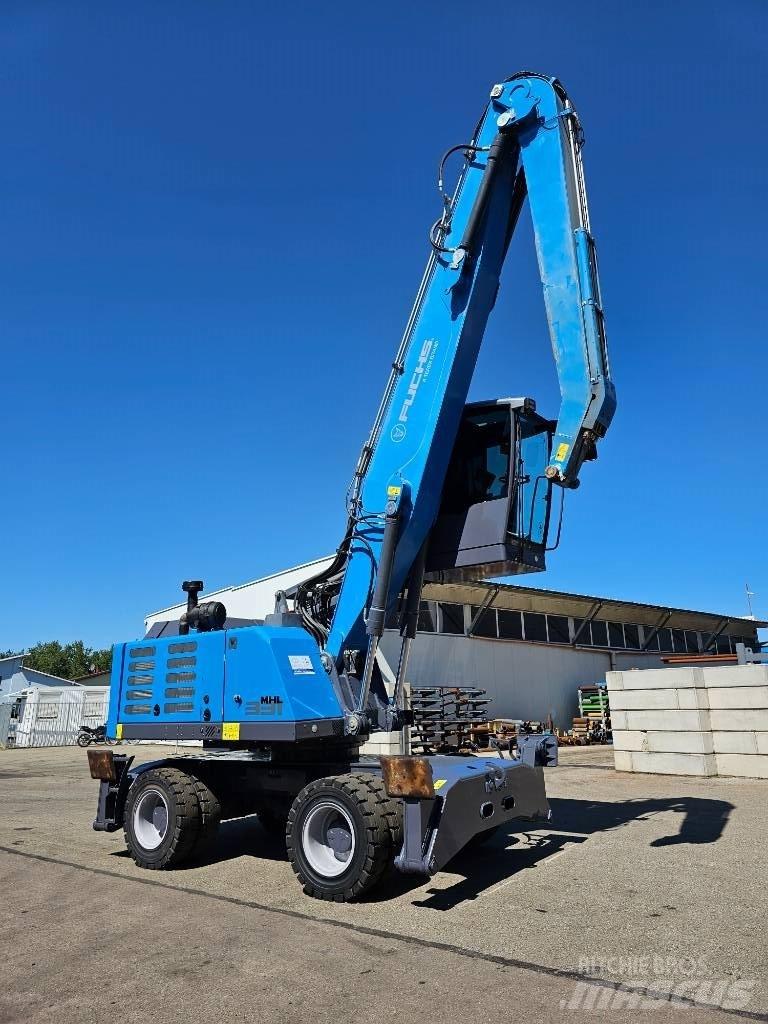 Fuchs MHL 331 Paleta de manipulare