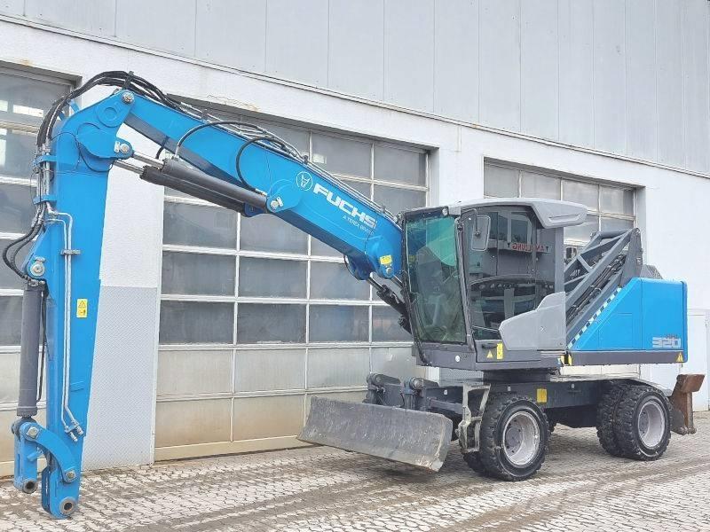Fuchs MHL 320 F Paleta de manipulare