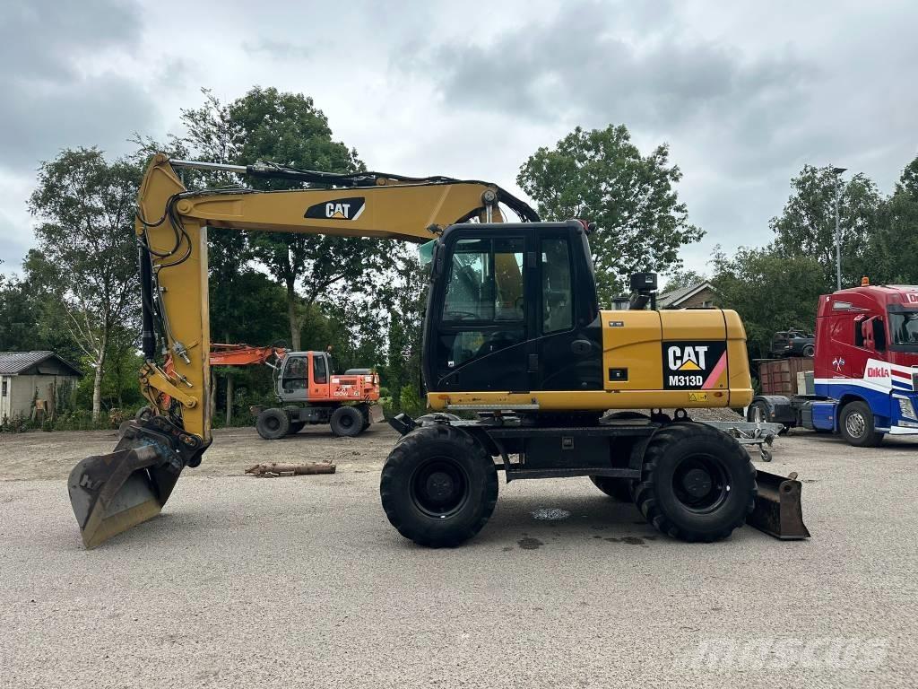 CAT M 313 D Excavatoare cu roti