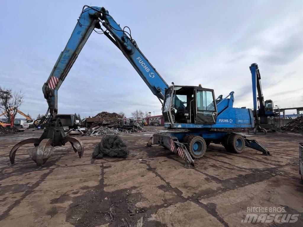 Fuchs MHL 340 Paleta de manipulare