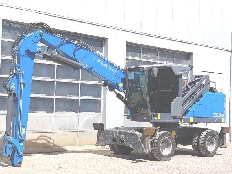 Fuchs MHL 320 F Paleta de manipulare