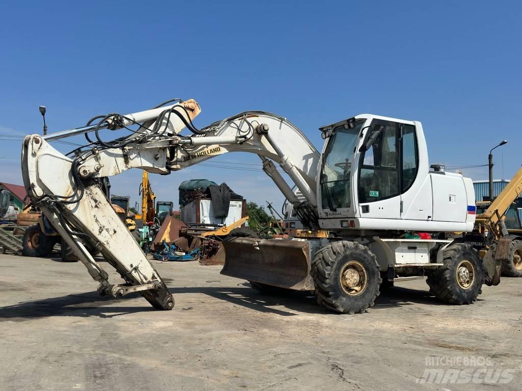 New Holland MH Plus Excavatoare cu roti