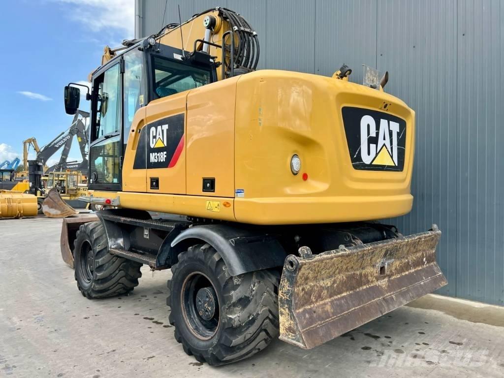 CAT M318F Excavatoare cu roti