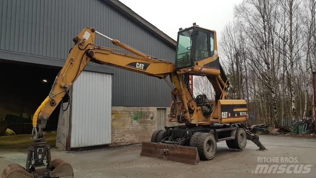 CAT M 318 Paleta de manipulare