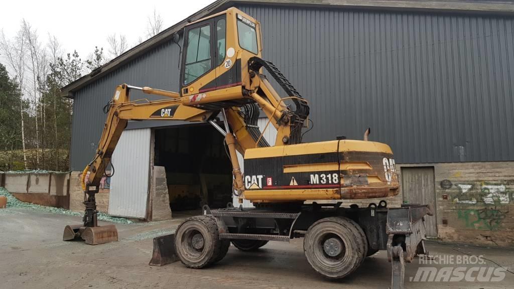 CAT M 318 Paleta de manipulare