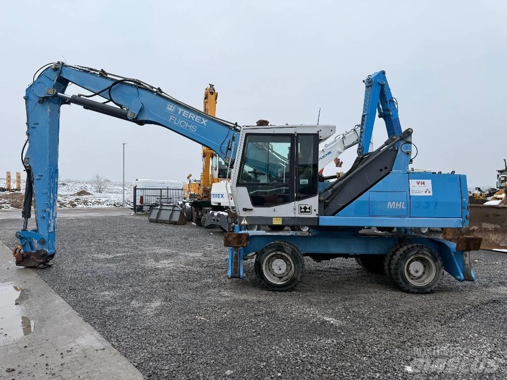 Fuchs MHL 331 Paleta de manipulare