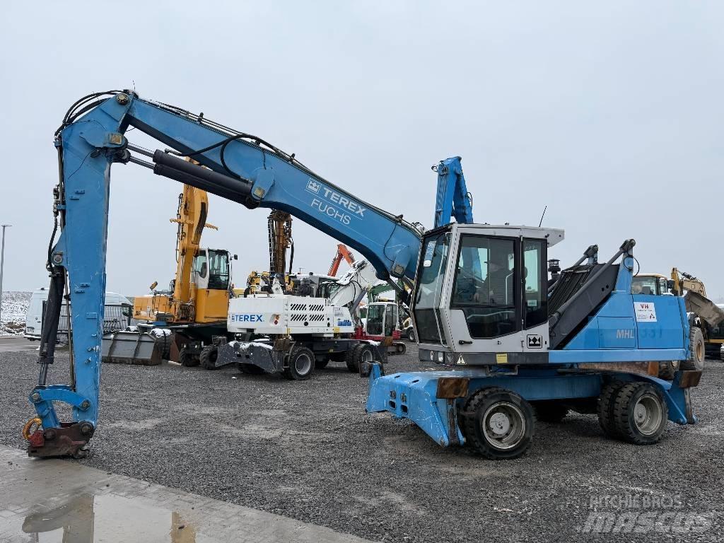 Fuchs MHL 331 Paleta de manipulare