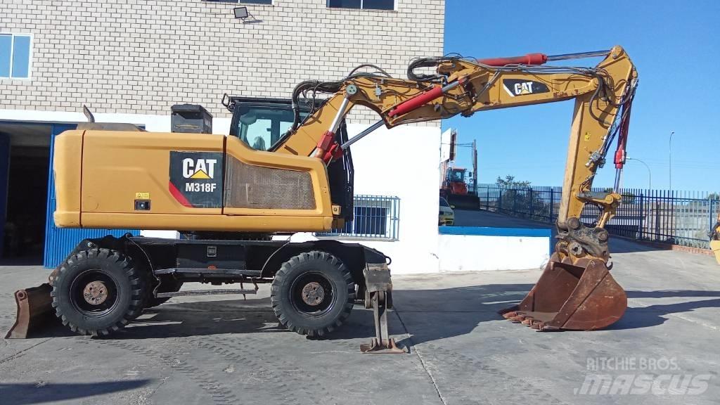 CAT M318F Excavatoare cu roti