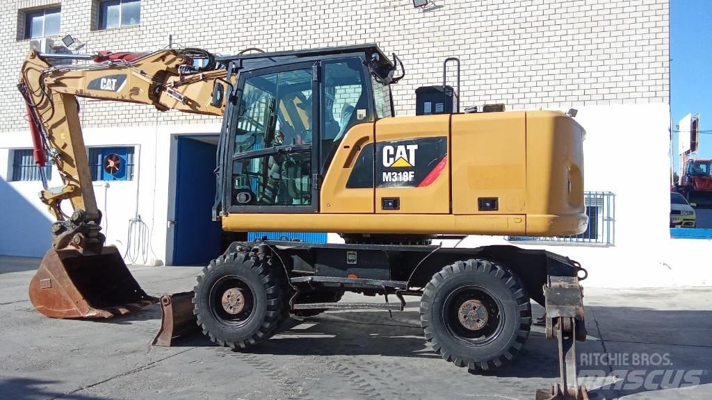 CAT M318F Excavatoare cu roti