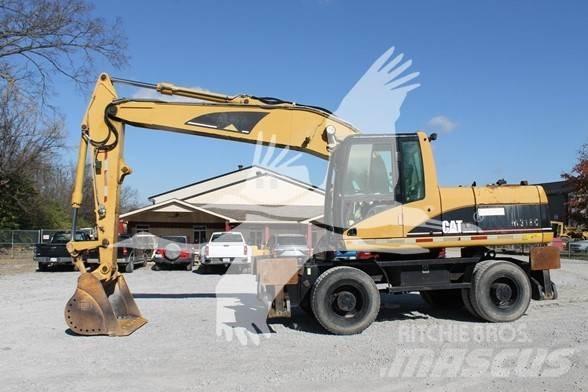 CAT M318C Excavatoare cu roti