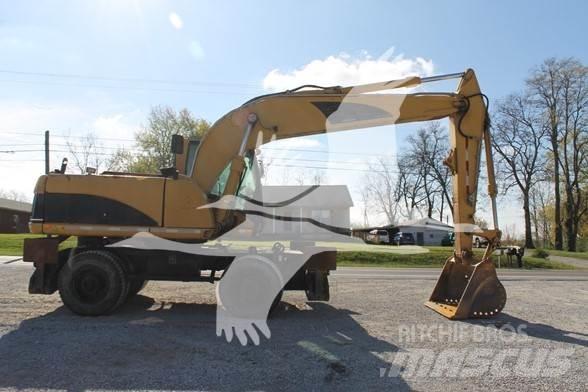 CAT M318C Excavatoare cu roti