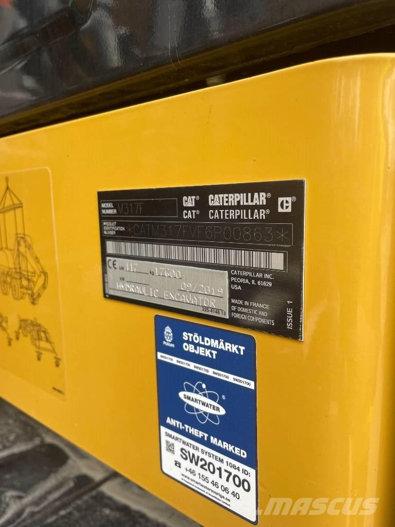 CAT M317F Excavatoare cu roti