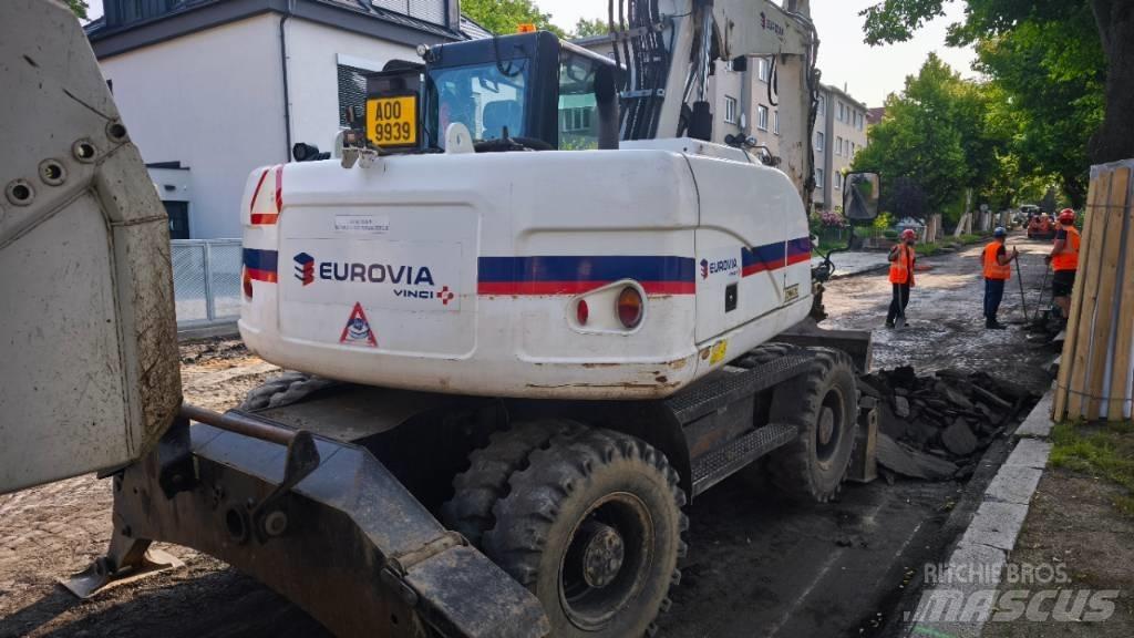 CAT 313 D Excavatoare cu roti