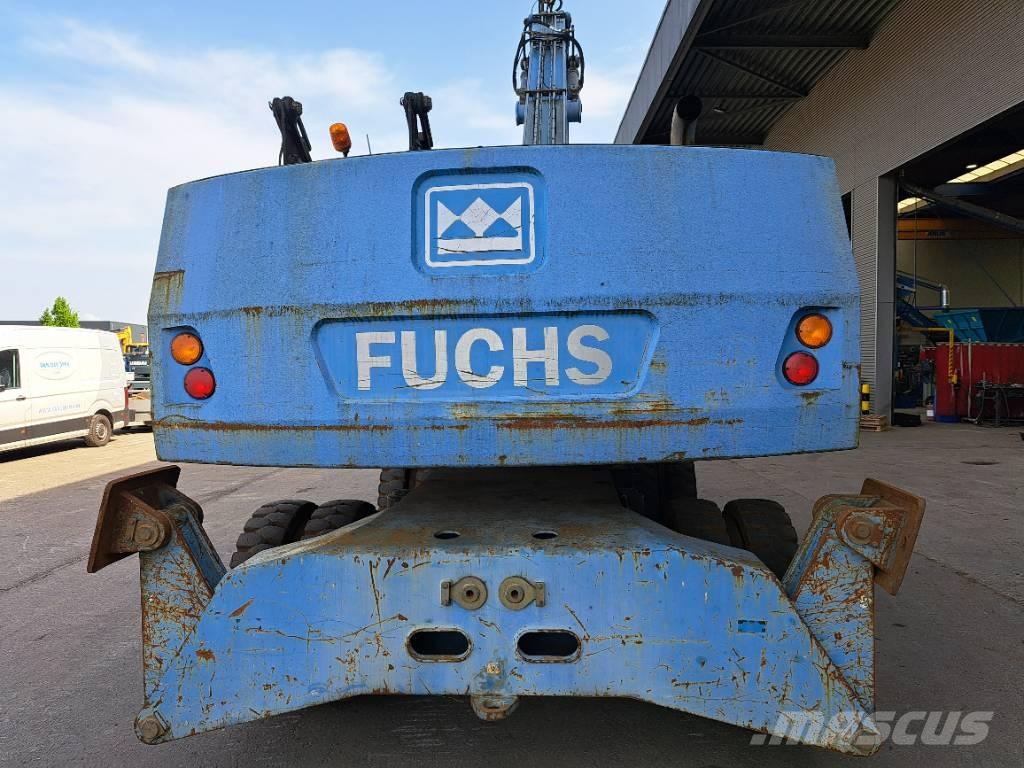 Fuchs MHL 340 D Paleta de manipulare